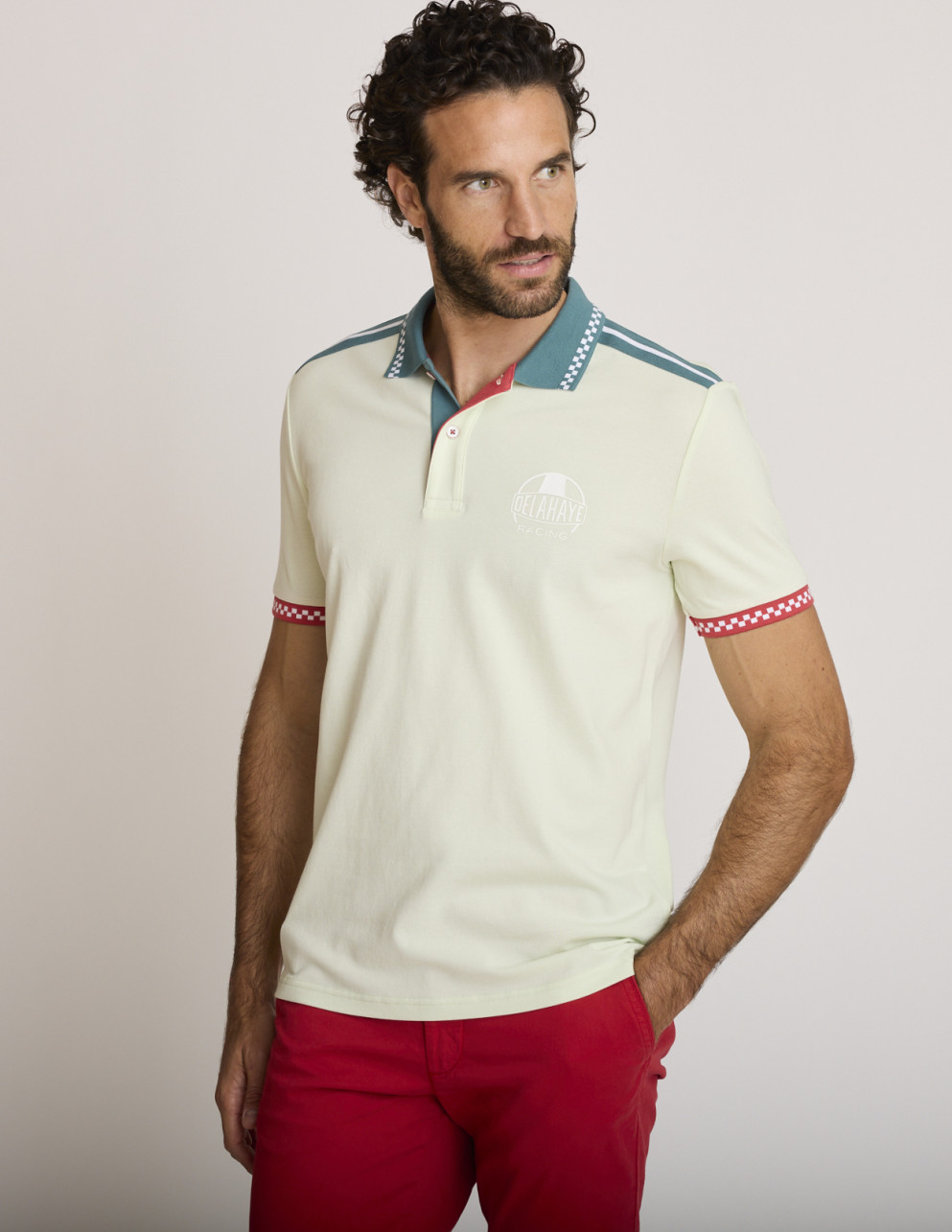 Polo sportiva ricamata...