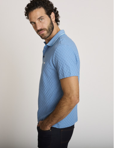 Polo con efecto damero azul celeste...
