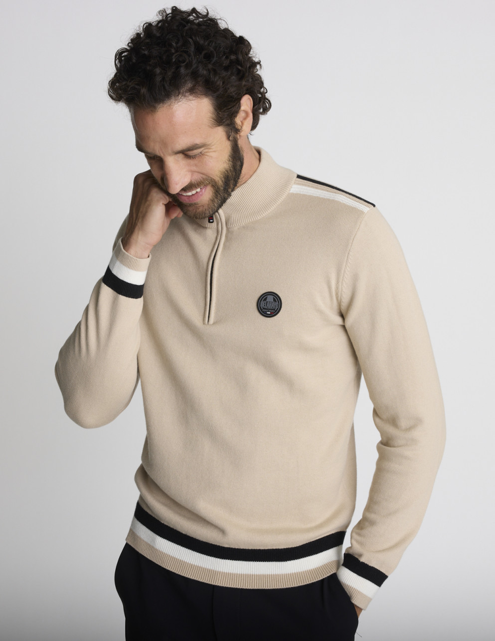 Pull col camionneur beige...